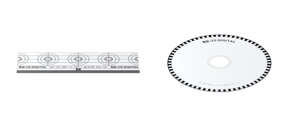 photo of a US Digital linear strip and encoder disk next to each other on a white background